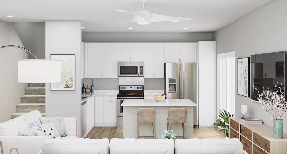 Staged kitchen and living area of Plan 10 (ʻOhi floor plan) of Mamaka.