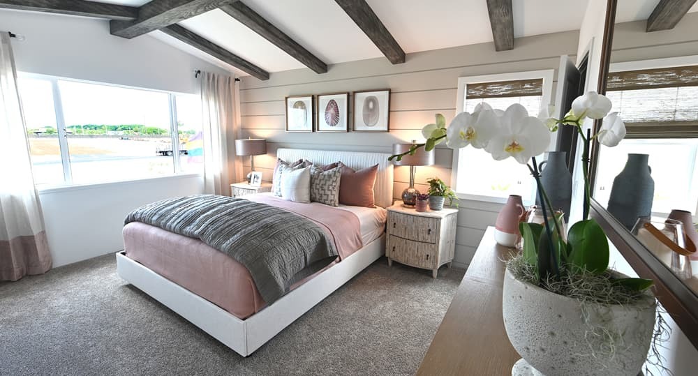 Luana (Plan 4) Bedroom. Cable is included in bedrooms along with USB outlets.