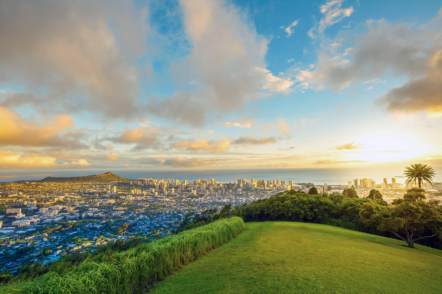 Watch the sunset from Puu Ualakaa State Park, a lookout on Tantulus.