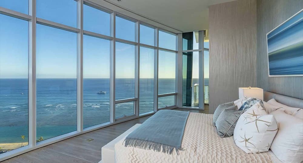 Floor-to-ceiling windows in your primary bedroom.